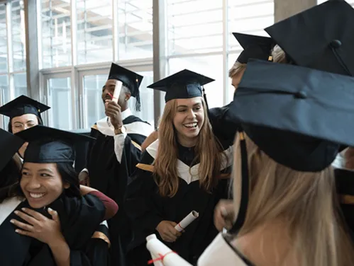 graduates in caps and gowns