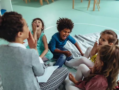 young children laughing