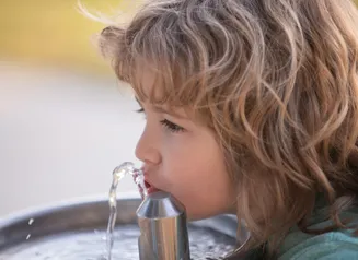 student drinking water