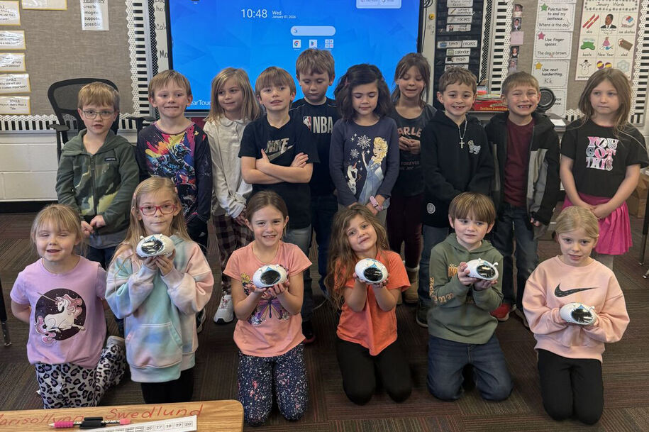Mrs. Hamilton's class in Central Decatur shows off a set of physical computing devices.